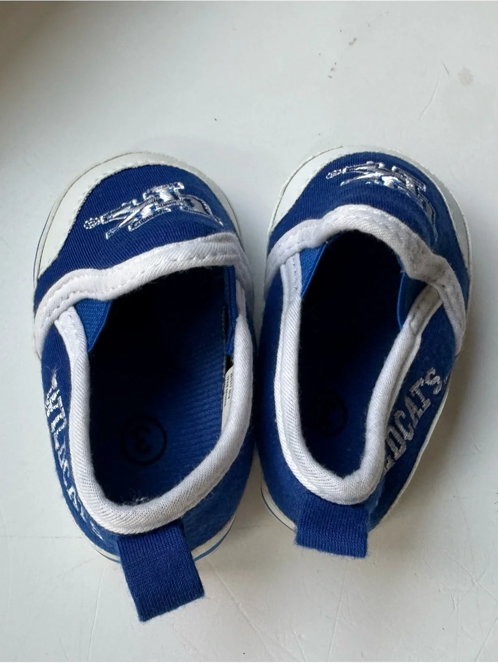 University Blue Kids Slip-On Shoes with Team Logo